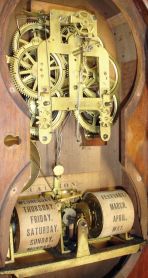 Seth Thomas Clock Co., Thomaston, Conn., "Parlor Calendar No. 5" shelf clock with a spring driven, 8 day, time and strike movement with the R. T. Andrews patented perpetual calendar mechanism in a polished walnut veneered case.