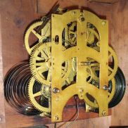 Ansonia Clock Co., New York, NY, "Regulator A" hanging clock with a spring driven, 8 day, time and strike movement in a walnut case.