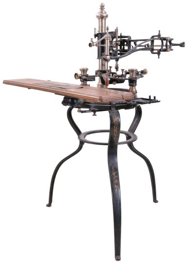 Francis Engraving Co., pantograph engraving machine, japanned cast iron frame and base with painted decoration, nickel plated columns supporting the pantograph and work holder, oak clamping shelf for templates, with a large number of zinc letter and number templates in various fonts