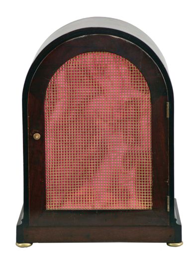 Winterhalder & Hofmeier, Schwarzenbach, Germany, 8 day double fusee Westminster chime movement in a rounded Gothic style case on bun feet, with round silvered brass dial showing Roman numerals, c1900.