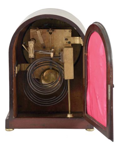 Winterhalder & Hofmeier, Schwarzenbach, Germany, 8 day double fusee Westminster chime movement in a rounded Gothic style case on bun feet, with round silvered brass dial showing Roman numerals, c1900.