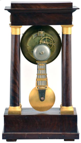 France, portico clock, mahogany veneered oak case with gilt mounts, Roman numeral white enamel dial with gilt bezel and engine turned center, blued steel Breguet style hands, 8 day pendule de Paris movement with regulator style gridiron pendulum