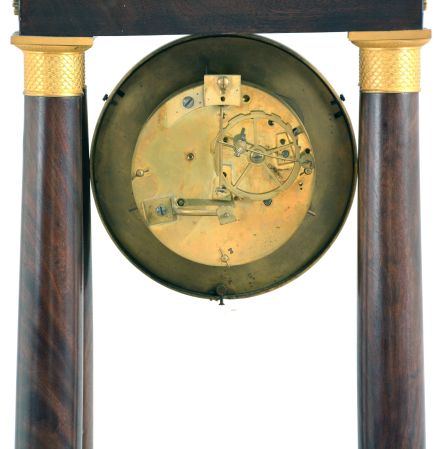 France, portico clock, mahogany veneered oak case with gilt mounts, Roman numeral white enamel dial with gilt bezel and engine turned center, blued steel Breguet style hands, 8 day pendule de Paris movement with regulator style gridiron pendulum