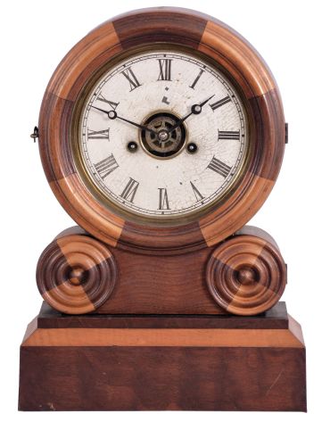 E. Ingraham & Co., Bristol, Conn., "Grecian Mosaic" shelf clock with a spring driven 30 hour time, strike and alarm movement in a walnut and maple case.