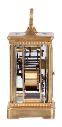 France, for Bigelow, Kennard, & Co., Boston, striking carriage clock, the gilt Corniche variant case with narrow fluted band above base and below cornice, Arabic numeral white enamel dial, blued steel Breguet style hands, 8 day striking movement with lever platform, sounding the hour and half hour in passing