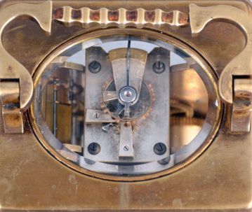 France, for Bigelow, Kennard, & Co., Boston, striking carriage clock, the gilt Corniche variant case with narrow fluted band above base and below cornice, Arabic numeral white enamel dial, blued steel Breguet style hands, 8 day striking movement with lever platform, sounding the hour and half hour in passing