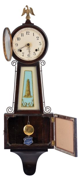 Clocks- 2 (Two): (1) William L. Gilbert Clock Co., Winsted, Conn., "Observatory" hanging clock with a spring driven, 8 day timepiece movement with a simple calendar mechanism in an oak Case, c1913; (2) Sessions Clock Co., Forestville, Conn., unidentified banjo clock with a spring driven, 8 day, time and strike movement in a mahogany finish case. c 1925.