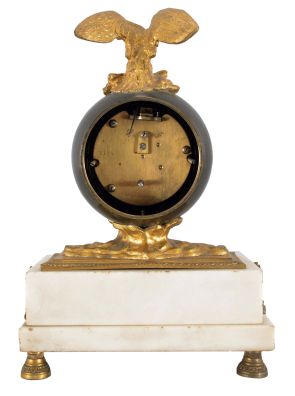 French mantel clock, 8 day, time only spring driven movement balance wheel movement on a white marble base with gilt metal ornaments, patinated spherical body with applied roman numerals, hands in the form of a snake, surmounted by a gilt cast metal eagle with outstretched wings. Diminutive round movement is stamped "FRENCH MAKE".