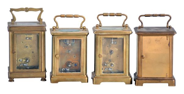 Clocks- 4 (Four) carriage: France, all with glazed brass cases with 8 day timepiece movements, three lever and one cylinder platform, three with white enamel dials and blued steel hands, one marked "John Wanamaker Philadelphia New York Paris", another marked "A. Stowell & Co., Inc., Boston", and one marked Elgin, dimensions of largest clock listed