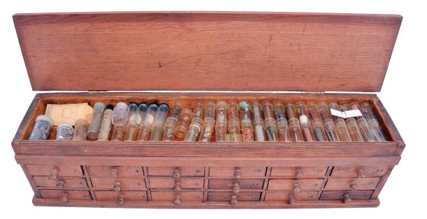 Three watchmakers parts cabinets with contents, the first a 6 drawer, containing wrist and pocket watch hands, the next a 7 drawer, with miscellaneous Swiss material, and the last with 18 drawers, and lift top for vial storage, containing screws, dial washers, case joint pins, jump rings, and more, dimensions of 24 drawer cabinet listed