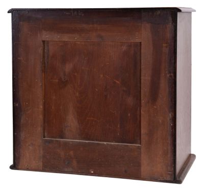 Watchmakers 7 drawer crystal cabinet in walnut with porcelain knobs, containing open face and hunting case crystals ranging in size from15 - 21