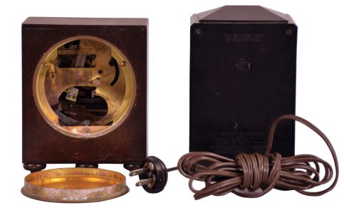 Clocks- 2 (Two) Early Electric Desk Clocks: (1) General Electric Co., U.S.A., "Executive" plug-in digital clock with engraved brass front plate and rotating seconds wheel, minute, and hour drums, c1933. (2) ATO, France, electromechanical battery-powered desk clock in an inlaid burled walnut and rosewood case. Movement is stamped "Leon Hetot", who was an innovator in electric clock movements, c1925.