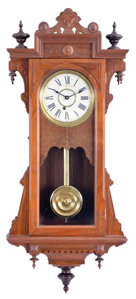E. Ingraham & Co., Bristol, Conn., "Bartholdi" wall hanging clock with a spring driven, 8 day timepiece movement in a walnut case.