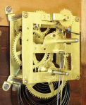 E. Ingraham & Co., Bristol, Conn., "Bartholdi" wall hanging clock with a spring driven, 8 day timepiece movement in a walnut case.
