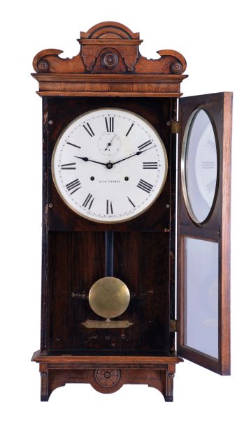 Seth Thomas Clock Co., Thomaston, Conn., "Office 30 Day - Variant" wall hanging clock with a spring driven 30 day timepiece movement in an "old oak" case.