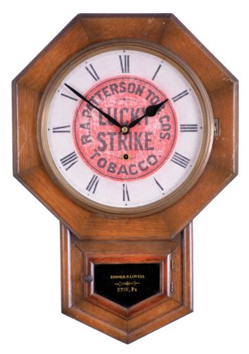 New Haven Clock Co., New Haven, Conn., "Drop Octagon" wall clock with Lucky Strike advertising, 8 day, time only, spring driven movement in an oak case with a tablet stenciled with retailer "Zimmer & Lovell, Eerie, Pa"