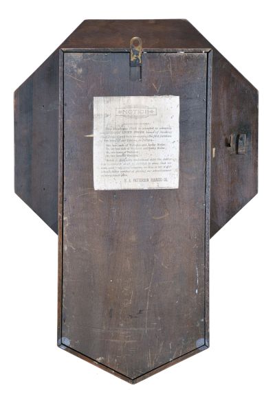 New Haven Clock Co., New Haven, Conn., "Drop Octagon" wall clock with Lucky Strike advertising, 8 day, time only, spring driven movement in an oak case with a tablet stenciled with retailer "Zimmer & Lovell, Eerie, Pa"