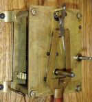 William L. Gilbert Clock Co., Winsted, Conn., "Regulator No. 14" hanging clock with a weight driven 8 day timepiece movement with dead beat escapement and retaining power, in an oak case.