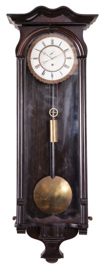 Austria or Germany, Vienna regulator, 8 day, time only, weight-driven movement in a walnut case with serpentine crest, two-piece porcelain dial with pie crust bezel with subsidiary in sunk portion, brass pendulum disc and weight, c.1890