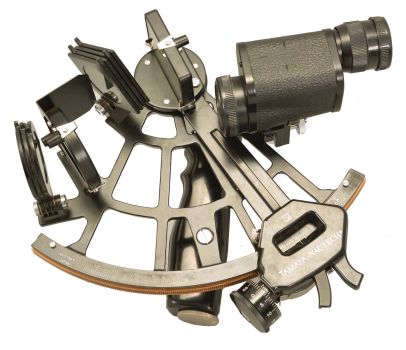 Tamaya Nautech, Japan, Model 733 sextant, 6.5 inch radius, black aluminum alloy frame with bronze arc reading 0-120, micrometer drum, multiple shades for horizon and index mirrors, 4x power and 6x power sighting scopes, battery compartment in the black plastic handle, all in finger-jointed mahogany case, serial number 37961, dated 1977.