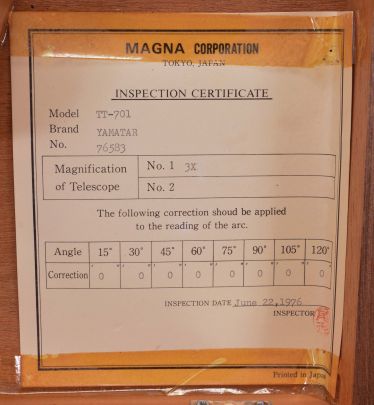 Magna Corporation, Tokyo, Japan, Yamatar Model TT-701 sextant, 5 inch radius, metal frame with black crinkle finish, graduated brass arc reading 0-110, micrometer drum, dual shades for both horizon and index mirrors, 3x power sighting scope, black plastic handle, all in finger-jointed mahogany case, serial number 76583, dated 1976.