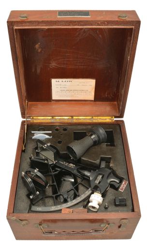 M. Low, New York, for U.S. Navy "US Navy MK-3, Mod-0" sextant, 6.5 inch radius, black metal frame, Navy identification on index arm and mount for index mirror, graduated arc reading 0-120, micrometer drum, shades for horizon and index mirrors, sighting scope, and black plastic handle with battery compartment, all in mahogany box with plaque reading "U.S. Naval Ships Systems Command" with a certificate dated 1970.