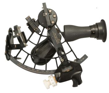 M. Low, New York for U.S. Navy, "Mark III, Model 0" sextant, 6.5 inch radius, black metal frames, Navy identification on index arm and rear of index mirror holder, graduated arc reading -5 to125, micrometer drum, shades for horizon and index mirrors, sighting scopes, push-button illumination, and black plastic handle, all in wood box with certificate under the lid dated 1973.