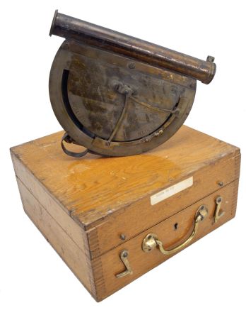 Hall Colby, New York, "Altimeter" or gravity sextant, lacquered brass, 9.5 inch sighting tube atop a graduated brass arc reading 90 to 0 to 90. Center of arc reads "HALL COLBY / ALTIMETER / Patent Applied For / No. 21". Two vernier scales, one for the "ALTITUDE" scale showing degrees from a horizontal axis and one for the "ZENITH" scale showing degrees from a vertical axis. Free-swinging pendulum establishes a vertical line of reference against which the angles are measured. Spring-loaded pin locks pendulum when a reading has been made.
