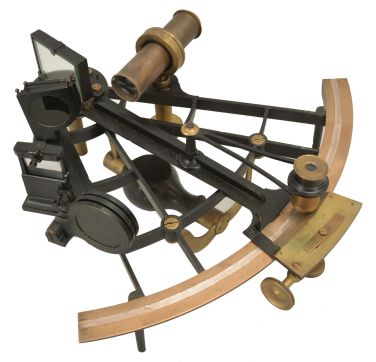 Janet Taylor, London, 7.5 inch radius, black metal ladder frame, brass arc signed Mrs. Janet Taylor, 104 Minories, London" with inset silver scale with graduations reading -5 to 150, tangent screw vernier adjustment, index magnifier, sighting telescopes, multiple sun shades for index and horizon mirrors, ebony handle, all in a felt-lined dovetailed mahogany box with accessories.