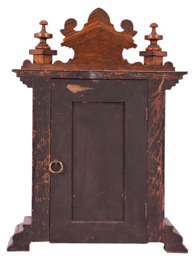 Ansonia Clock Co., New York, "Salem" cabinet shelf clock with a spring driven, 8 day, time and half hour strike movement in an oak case.