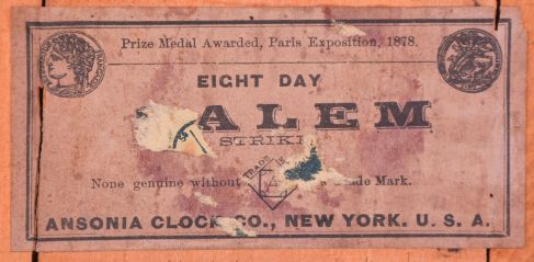 Ansonia Clock Co., New York, "Salem" cabinet shelf clock with a spring driven, 8 day, time and half hour strike movement in an oak case.