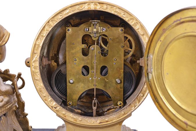 Ansonia Clock Co., New York, "Shakespeare" statue mantel clock with an 8 day spring driven time and strike movement with visible escapement in an enameled iron base with a bronzed spelter statue.