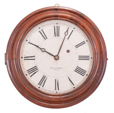 Brewster & Ingrahams, Bristol, Conn., Gallery hanging clock with an 8-day spring driven East-West timepiece movement with a brass spring in a crotch mahogany case.