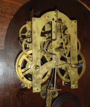 Ansonia Clock Co., New York, "Forrest", 8 day, time and strike, spring brass movement wall clock.