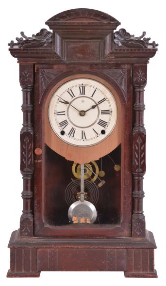 Seth Thomas Clock Co., Thomaston, Conn., "Hecla" shelf clock with a spring driven time and quarter strike movement in a walnut case.