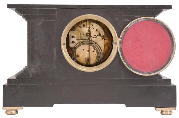 France for the English market, mantel clock, 8 day, time and strike with perpetual calendar showing the days, date, and months in English, spring driven movement with Brocot escapement in a black slate case with variegated marble columns and insets, enameled dial with subsidiary for the calendar functions.