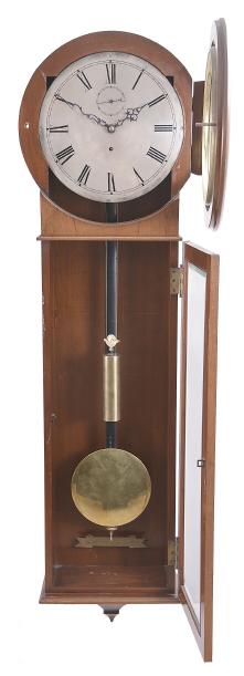 Seth Thomas Clock Co., Thomaston, Conn., "Regulator No. 62" wall clock, 8 day, time only, weight driven movement in a mahogany case with meter long pendulum, maintaining power and silvered dial