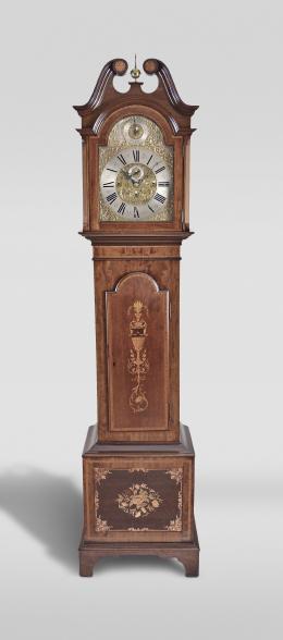 England, a good early 20th century inlaid mahogany tall clock, the bracket feet supporting a base with mahogany and satinwood cross-banded frame with inset panel having floral marquetry and scrolled foliate border, the trunk door also with satinwood cross-banding surrounding a neoclassical urn with bellflower and trailing vine, terminating in a lion