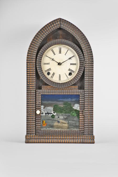 E.N. Welch Mfg. Co., Forestville, Conn., 8 day, time and strike spring driven brass movement ripple-front round gothic or " beehive" shelf clock.