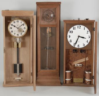 Clocks- 3 (Three) master: (1) Carl Bohmeier, Germany, master clock, time and impulse for secondary clock, weight driven brass movement with deadbeat escapement and electrically powered auto-winder in an oak case with silvered dial, black steel hands, and basic compensating pendulum, c1940; (2) Unknown, master clock, time only, electrically impulsed pendulum in an oak case with engraved copper dial, c1930; (3) Miller Program Clock Co., Minneapolis, Minn., "Type Three Miller Program Clock", program clock, time and signal, electrically powered movement in an oak case with painted metal dial, c1940.