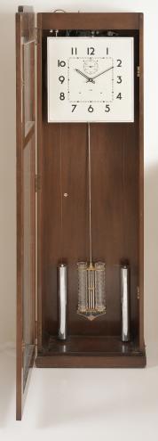 Clocks- 3 (Three): International Business Machines Corp., Endicott, NY, office regulator wall clocks, time only, weight driven electrically wound movements in Art Deco hardwood cases, painted aluminum dials with arabic numerals, subsidiary seconds and black metal hands, c1930.