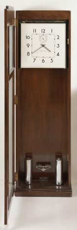 Clocks- 3 (Three): International Business Machines Corp., Endicott, NY, office regulator wall clocks, time only, weight driven electrically wound movements in Art Deco hardwood cases, painted aluminum dials with arabic numerals, subsidiary seconds and black metal hands, c1930.