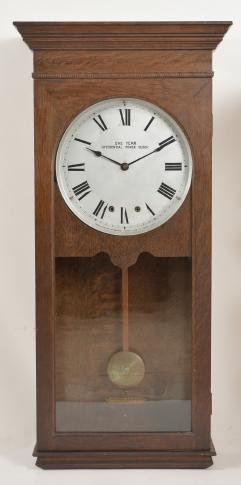 Clocks- 3 (Three): (1) National Time Recorder Co., London, England, master clock, brass movement with electrically impulsed pendulum in a mahogany case with painted metal dial, c1940; (2) Differential Power Clock Co., Chicago, "One Year Differential Power Clock" wall clock, year running, time only, driven by two springs brass movement in a robust oak case and with signed metal dial, c1910; (3) McClintock-Loomis Company, Minneapolis, Minn., master clock, 8 day, time and program mechanism, spring driven brass clock movement and second spring driven program movement in a wood case with painted copper dial, c1930.