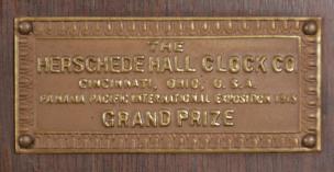 Herschede Hall Clock Co., Cincinnati, Ohio, "Model 10" floor standing clock, 8 day, time and strike with Westminster and Canterbury chime, spring driven brass movement in a mahogany case with silvered dial, c1930.