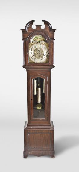 Unknown, England, hall clock, 8 day, time and strike with Westminster chimes, three train weight driven brass movement with deadbeat escapement in a walnut case with molded base, glazed door, and hood with broken arch, arched dial with silvered chapter ring with applied brass numerals, pierced and engraved spandrels and dial center, moon phase dial, chime / silent selector, and subsidiary seconds dial.