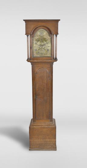 John Nevil, Norwich, England, longcase clock, 8 day, time and strike with date, weight driven brass movement in an oak case with flat-top hood with dentil molding, engraved brass dial with matte center and applied spandrels, subsidiary dials for seconds and strike/silent, blued steel hands.