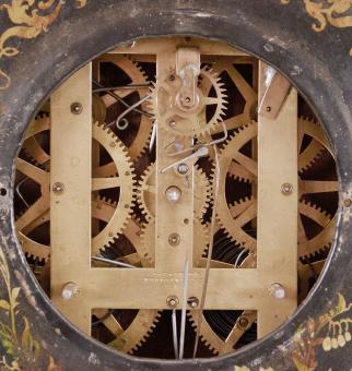 J.C. Brown, Bristol, Conn., iron front shelf clock, 8 day, time and strike, spring driven brass movement in an iron front case with mother of pearl inlay within floral painting, stenciled gold painted borders, painted metal dial and steel club hands.