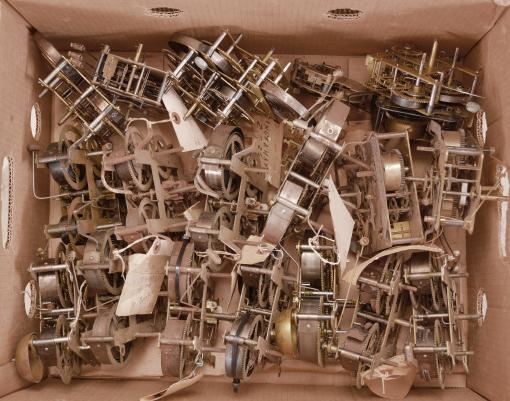 Parts- 40 (Forty) clock movements: American, 30 hour and 8 day, mostly time and strike, spring driven brass movements by makers including Seth Thomas, Waterbury, N. Pomeroy, E.N. Welch, Sessions, Gilbert, and E. Ingraham. Lot also includes a couple of more recent German movements