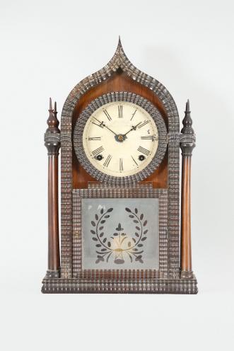 J.C. Brown, Forestville Mfg. Co., Bristol, Conn., 8 day, time and strike spring driven brass movement 4-column round gothic or onion top ripple molding shelf clock.