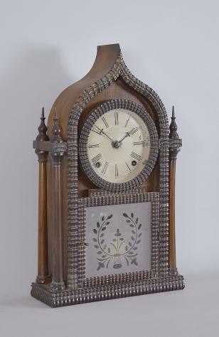 J.C. Brown, Forestville Mfg. Co., Bristol, Conn., 8 day, time and strike spring driven brass movement 4-column round gothic or onion top ripple molding shelf clock.